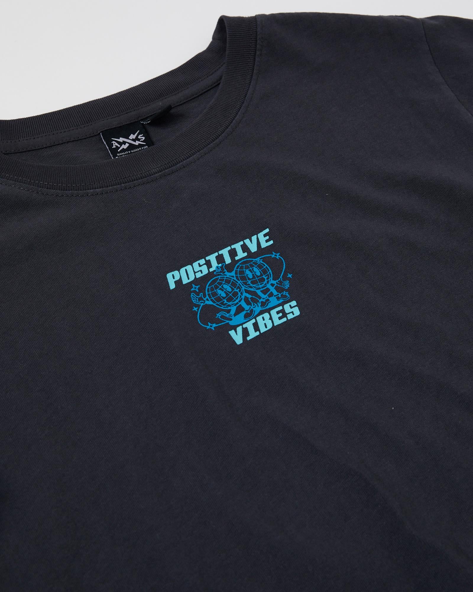 The Teen Boys Positive Vibes Tee from Alphabet Soup is a comfy cotton shirt with a washed black look and playful prints. Equipped with a crew neck and straight hem.
