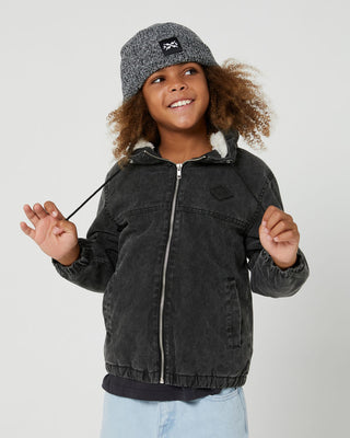 Expertly crafted Teen Boys Summit Canvas Jacket by Alphabet Soup. Vintage dark grey wash treatment, inner Sherpa fleece lining, fixed hood design, elasticated hemline and cuffs. Stay comfortable with front hand pockets.