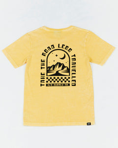Alphabet Soup's Teen Mystical Tee in washed yellow cotton jersey for boys ages 8-16. Featuring a rad print “Take The Road Less Travelled” design on front and back, short sleeves, crew neck, and straight hemline.