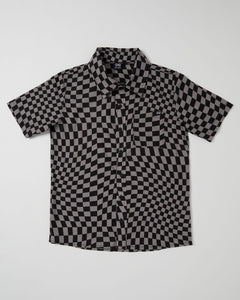 Alphabet Soup's Kids Warped Short Sleeve Shirt for boys aged 2 to 7. Crafted of 100% cotton with a vintage-washed finish, comfy classic fit, button-through placket, open chest pocket, and curved hemline—plus an extra-cool checkerboard pattern and woven clip label.