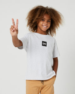 Experience the ultimate in comfort and style with the 100% cotton Kids Box Short Sleeve Tee from Alphabet Soup. Perfect for skateboarding and BMX, this shirt features a roomy box fit and ribbed crew neckline, along with a stylish logo patch.
