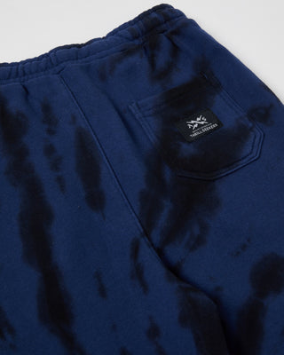 Expertly crafted Kids Box Trackpants by Alphabet Soup with 100% cotton and a blue & black tie dye print. Features a comfortable regular fit, elasticated waist with drawcord, and convenient hand and back pockets.