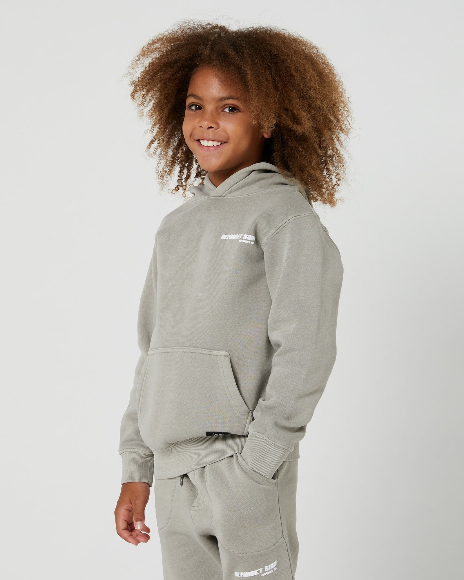 Vintage-inspired Kids Hoodie by Alphabet Soup! Heavy brushed back fleece for comfort & a boxy skate fit. Raised puff logo for playful touch. Perfect for skate-loving boys. Fixed hood & front pocket.