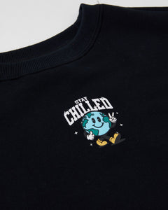 The Teens Boys Black Stay Chilled Crew by Alphabet Soup is a comfortable jumper with a crew neck, long sleeves, and bold embroidered art designs on the front and arms. It also features ribbed cuffs and a hemline for a snug fit, and a woven brand patch for a skater-inspired look.