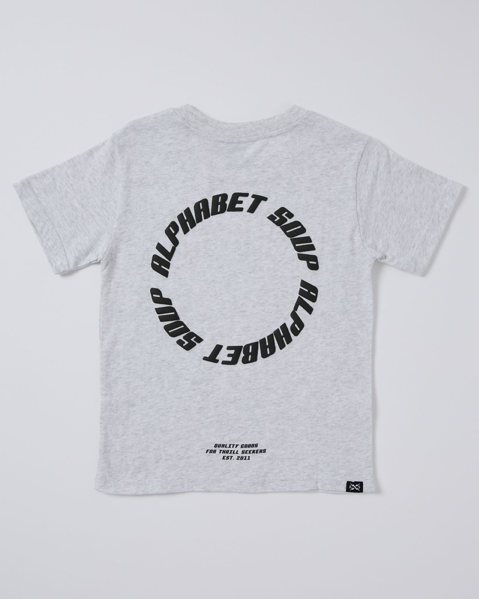 Teen San Clemente Tee by Alphabet Soup. Made with 100% Cotton Jersey, it features a vintage garment dye wash, puff logo print, and a woven logo patch