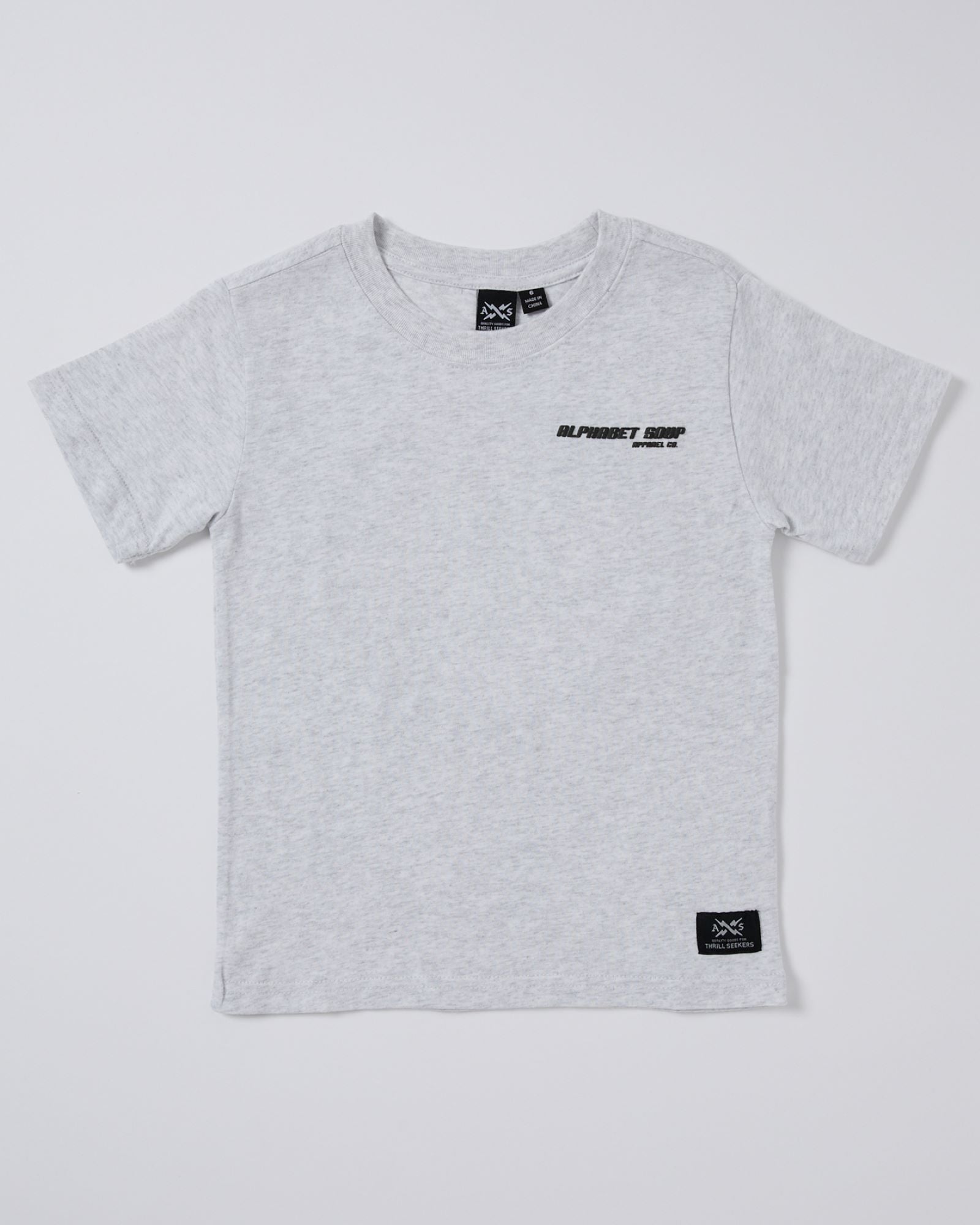 Teen San Clemente Tee by Alphabet Soup. Made with 100% Cotton Jersey, it features a vintage garment dye wash, puff logo print, and a woven logo patch