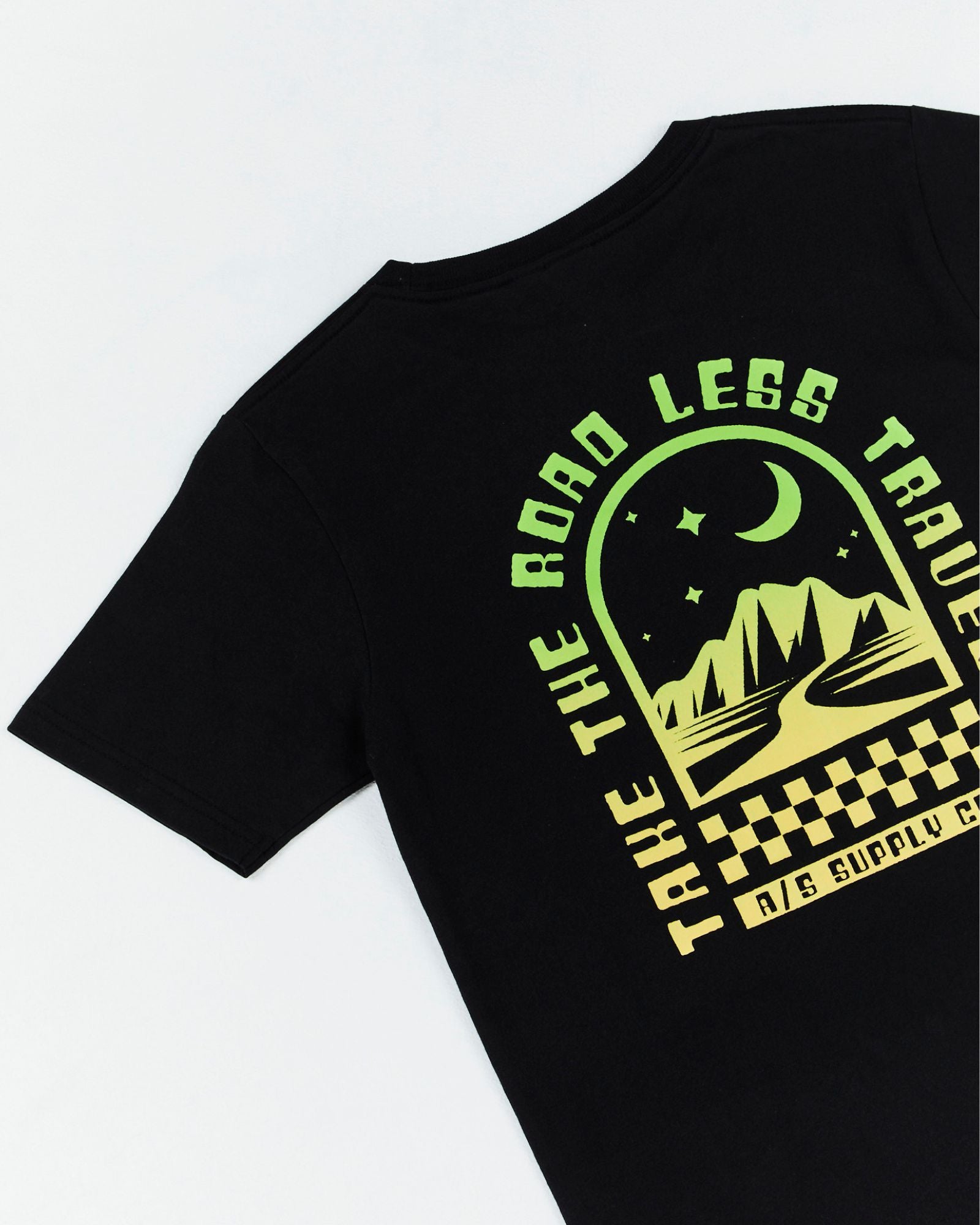 Alphabet Soup's Teen Mystical Tee in washed black cotton jersey for boys ages 8-16. Featuring a rad print “Take The Road Less Travelled” design on front and back, short sleeves, crew neck, and straight hemline.