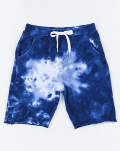 Kids Cloud Surfer Short by Alphabet Soup. Relaxed fit, 100% cotton French Terry with elastic waist, adjustable drawcord and faux fly provide dreamy comfort. Stylish marble tie dye and embroidery under pocket.