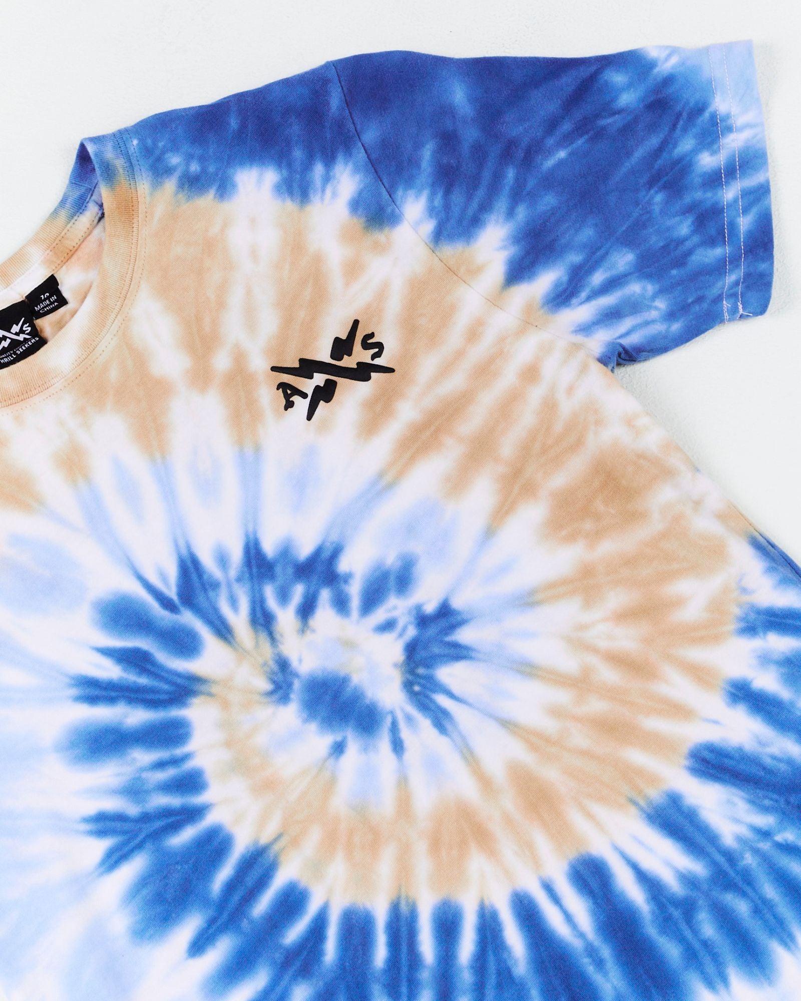 Alphabet Soup's Kids Dunked Tee for boys aged 8 to 16. Crafted in bright blue swirl tie dye & 100% cotton jersey for comfort. Features regular fit, straight hemline, short sleeves, ribbed crew neckline & puff print on chest. 