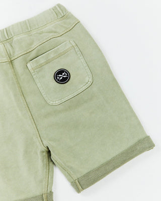 Alphabet Soup's Fakie Shorts for boys aged 2-7, feature Thyme green Cotton French Terry w/roll-up hems, adjustable drawcord, faux-fly & pockets. Plus an embroidered logo at the back pocket.