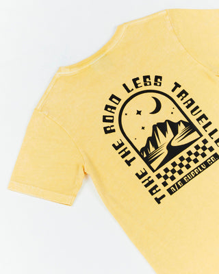 Alphabet Soup's Teen Mystical Tee in washed yellow cotton jersey for boys ages 2-7. Featuring a rad print “Take The Road Less Travelled” design on front and back, short sleeves, crew neck, and straight hemline.