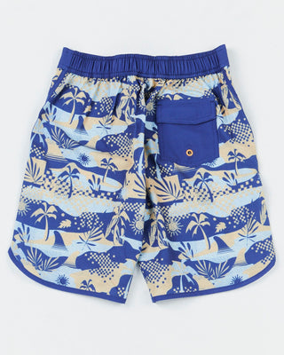 Alphabet Soup's Kids Poolside Boardshorts for boys aged 2-7. All-over tropical print in blues, drawstring waist, 4-way stretch, quick-dry Poly/Elastane blend and Velcro pocket.