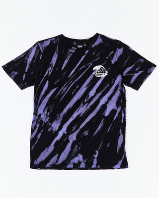 Teen Riptide Short Sleeve Tee by Alphabet Soup for boys aged 8-16. Crafted from 100% cotton jersey, this regular fit tee features short sleeves, a ribbed crew neckline, a straight hemline, and a two-tone diagonal purple and black tie dye. Plus, it has printed retro surf graphics to chest and back featuring “Here For The Swell Times”.