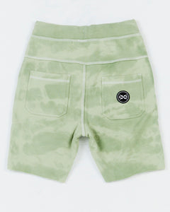 Kids Camo Short by Alphabet Soup for boys 8-16, featuring 100% green camo Cotton French Terry, adjustable drawcord, faux fly, raw hem, and pockets.