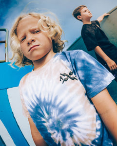 Alphabet Soup's Kids Dunked Tee for boys aged 2 to 7. Crafted in bright blue swirl tie dye & 100% cotton jersey for comfort. Features regular fit, straight hemline, short sleeves, ribbed crew neckline & puff print on chest. 