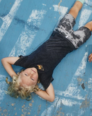 Kids Good Vibes Tee by Alphabet Soup! For boys aged 2-7. Featuring 100% black acid wash cotton jersey, “Good Vibes, Fun Times” retro surf prints on chest and back in yellow and green, reg. fit, straight hem, short sleeves and ribbed crew neck.