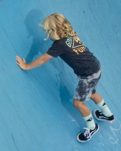 Kids Good Vibes Tee by Alphabet Soup! For boys aged 2-7. Featuring 100% black acid wash cotton jersey, “Good Vibes, Fun Times” retro surf prints on chest and back in yellow and green, reg. fit, straight hem, short sleeves and ribbed crew neck.