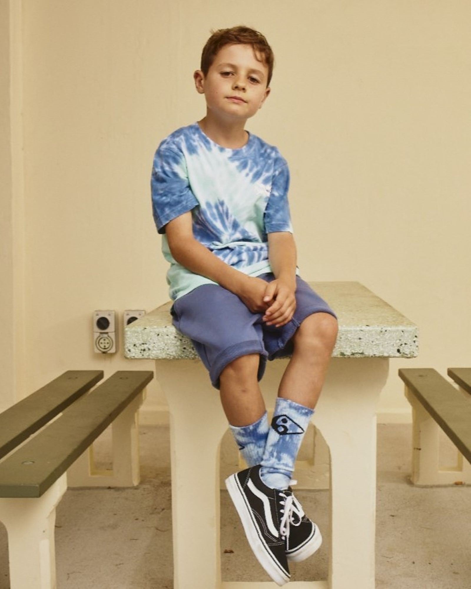 Kids Wipe Out tee by Alphabet Soup for boys aged 2-7. Featuring an all over mint green and ocean blue tie swirl print, logo trim, short sleeves, regular fit, straight hemline, ribbed crew neckline and puff logo print to chest.