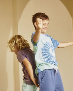 Teen Wipe Out tee by Alphabet Soup for boys aged 8-16. Featuring an all over mint green and ocean blue tie swirl print, logo trim, short sleeves, regular fit, straight hemline, ribbed crew neckline and puff logo print to chest.