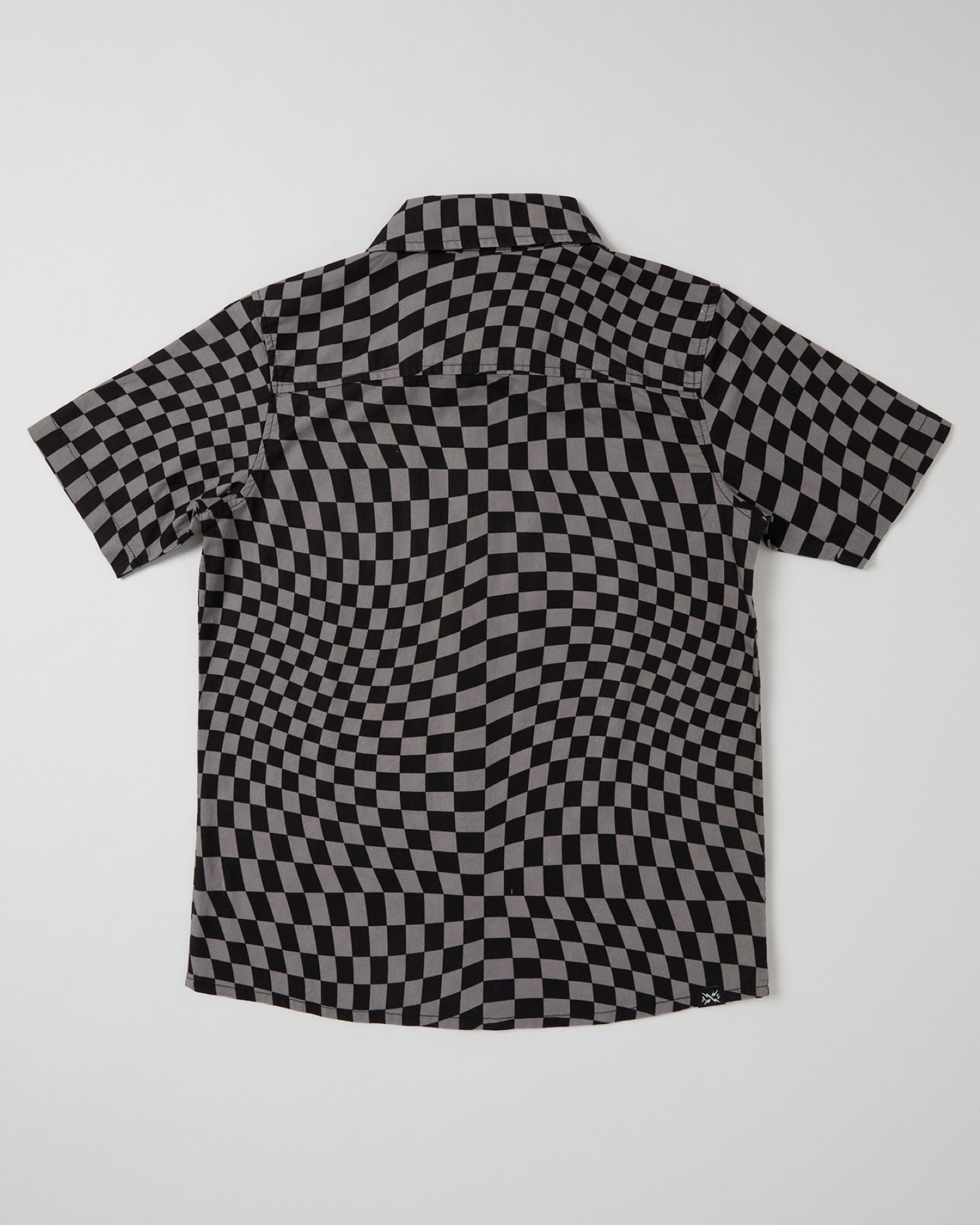 Alphabet Soup's Kids Warped Short Sleeve Shirt for boys aged 2 to 7. Crafted of 100% cotton with a vintage-washed finish, comfy classic fit, button-through placket, open chest pocket, and curved hemline—plus an extra-cool checkerboard pattern and woven clip label.